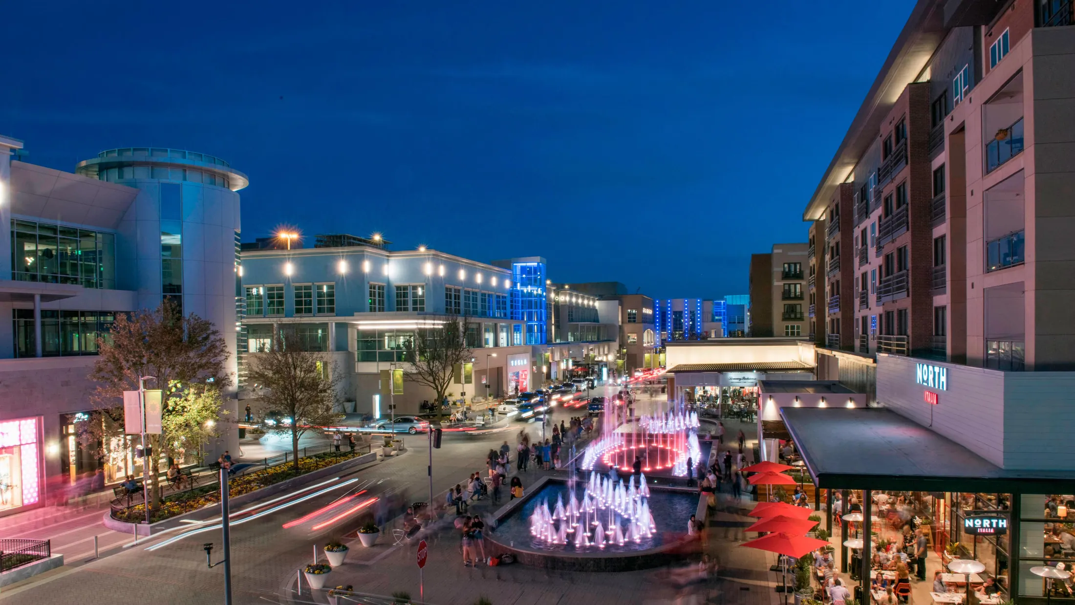 Legacy West retail and dining district at dusk